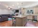 Spacious kitchen with granite countertops, stainless appliances, and an open floor plan at 308 Nashville Dr, Archer Lodge, NC 27527
