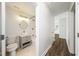 Bright bathroom with modern fixtures, stylish vanity, and combined shower over tub at 313 13Th St, Butner, NC 27509