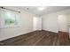 This bedroom showcases hardwood floors, natural light, and great space at 313 13Th St, Butner, NC 27509
