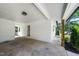 A covered carport provides parking and easy access to the side entrance of the home at 313 13Th St, Butner, NC 27509