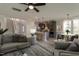 Open floor plan showcasing the kitchen, living, and dining areas with modern decor at 343 Augusta Pond Way # 176, Raleigh, NC 27603
