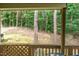 The outside covered patio has beautiful views of the surrounding forest and nature at 3622 Colchester St # 17, Durham, NC 27707