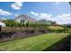 Well-maintained backyard with lush lawn and fence, ideal for outdoor activities and relaxation at 405 Bramble Ln, Clayton, NC 27527