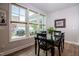 Bright dining area featuring large windows that provide ample natural light at 405 Bramble Ln, Clayton, NC 27527