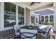 Inviting outdoor dining space on the patio with elegant seating, perfect for enjoying meals outdoors at 405 Bramble Ln, Clayton, NC 27527