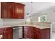 Well-appointed kitchen with stainless steel appliances and ample counter space at 4733 Royal Troon Dr, Raleigh, NC 27604