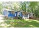 This home features a backyard patio with a lovely staircase at 5124 Lazywood Ln, Durham, NC 27712