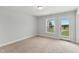Bright bedroom with a door to the outdoor at 529 Forestville Rd, Wake Forest, NC 27587