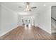 Open living area features hardwood flooring and flows into the kitchen at 529 Forestville Rd, Wake Forest, NC 27587
