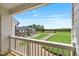 Balcony view of new construction homes and green space on a clear, sunny day at 529 Forestville Rd, Wake Forest, NC 27587