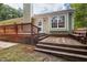 Inviting back deck with built-in seating, perfect for outdoor relaxation and entertaining at 6205 Houndsman Ct, Raleigh, NC 27616