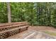 Backyard deck for relaxing and enjoying the nature and the peaceful, tree-filled outdoor space at 6205 Houndsman Ct, Raleigh, NC 27616