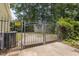 Gated backyard entrance for added privacy and security at 6205 Houndsman Ct, Raleigh, NC 27616
