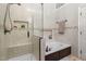 Bathroom featuring a glass-enclosed shower with a built-in seat and a soaking tub at 6205 Houndsman Ct, Raleigh, NC 27616