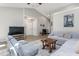 Inviting living space featuring comfortable seating, ample natural light, and stylish decor at 6205 Houndsman Ct, Raleigh, NC 27616