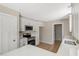 Modern kitchen featuring stainless steel appliances, granite counters, and white cabinetry at 7082 Cornwall Rd, Oxford, NC 27565