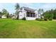Spacious backyard with lush greenery and an inviting outdoor space at 7304 Wexford Woods Ln, Wake Forest, NC 27587