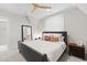 Bedroom featuring a ceiling fan, built in mirror and night stand with draw at 7304 Wexford Woods Ln, Wake Forest, NC 27587