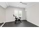 Bright home gym with large window and exercise equipment at 7304 Wexford Woods Ln, Wake Forest, NC 27587