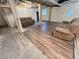 Partially finished basement with open layout, vinyl flooring, and updated features at 908 Valmet Dr, Durham, NC 27703