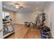 Spacious home gym with lots of equipment and hardwood flooring at 1009 Margarets Ln, Raleigh, NC 27614