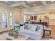 Open-concept living room with access to a kitchen and outdoor space at 1009 Margarets Ln, Raleigh, NC 27614