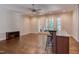 Living room with bar seating, recessed lights, ceiling fan, and hardwood flooring at 1009 Margarets Ln, Raleigh, NC 27614