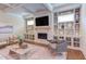 Elegant living room with built-in shelving and a cozy fireplace at 1009 Margarets Ln, Raleigh, NC 27614