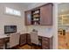 Dual desk area with custom cabinets offers a comfortable and organized workspace at 1009 Margarets Ln, Raleigh, NC 27614