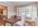 Bright office space with a window seat, wainscoting, and hardwood floors at 1009 Margarets Ln, Raleigh, NC 27614