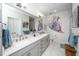 Bathroom features double sinks, modern lighting, and stylish wall art that adds a unique touch at 105 Chatham Walk Ln # 304, Cary, NC 27511