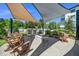 Inviting community outdoor grilling and seating area offering residents a social gathering space at 105 Chatham Walk Ln # 304, Cary, NC 27511