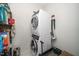 Compact laundry area featuring stacked washer and dryer units, maximizing space and functionality at 105 Chatham Walk Ln # 304, Cary, NC 27511