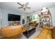 Inviting living room featuring stylish furnishings, modern lighting, and a wall-mounted television at 105 Chatham Walk Ln # 304, Cary, NC 27511
