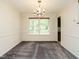 Inviting dining area with traditional chandelier at 108 S Drawbridge Ln, Cary, NC 27513