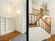 Bright foyer featuring a staircase, bookshelf and a blend of hardwood and carpet flooring at 108 S Drawbridge Ln, Cary, NC 27513