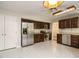 Well-lit kitchen with stainless steel appliances and plenty of cabinet space at 108 S Drawbridge Ln, Cary, NC 27513