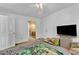 Bedroom with ceiling fan offers a relaxing retreat at 109 Mill Creek Dr, Youngsville, NC 27596