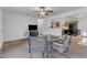 Cozy dining area with a table and chairs adjacent to the open kitchen space at 109 Mill Creek Dr, Youngsville, NC 27596