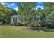 Charming one-story home features a manicured lawn and lovely front yard landscaping at 109 Mill Creek Dr, Youngsville, NC 27596