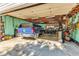 Spacious garage interior featuring ample storage, tools, and a parked pickup truck at 109 Mill Creek Dr, Youngsville, NC 27596