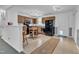 Traditional-style kitchen features wood cabinetry, black appliances and a kitchen island at 109 Mill Creek Dr, Youngsville, NC 27596