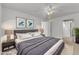 Serene bedroom features neutral tones, soft lighting and stylish decor at 109 Mill Creek Dr, Youngsville, NC 27596
