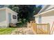 Backyard showcasing connecting decks and bonus space shed in private outdoor area at 109 N Dunn St, Angier, NC 27501
