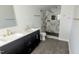 Modern bathroom with double vanity and luxurious glass shower at 109 N Dunn St, Angier, NC 27501