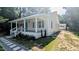 Charming single-story home with a welcoming front porch and well-maintained landscaping at 109 N Dunn St, Angier, NC 27501
