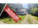 Charming one-story home with a inviting front porch and well-maintained yard with closing cost incentive at 109 N Dunn St, Angier, NC 27501