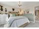 Charming bedroom with mixed media wall decor, complementing the clean lines and modern furnishings at 1204 Sparkling Lake Dr # 20, Apex, NC 27523