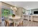 Inviting dining area with access to the patio, perfect for Gathering meals and gatherings at 1204 Sparkling Lake Dr # 20, Apex, NC 27523