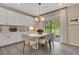 Cozy dining area featuring bright, natural light and ample seating space at 1204 Sparkling Lake Dr # 20, Apex, NC 27523